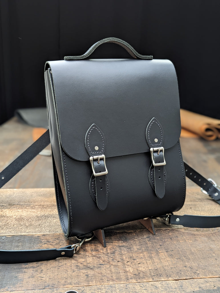 Mini Windsor backpack made with a Bolt-on Handle from Charcoal Black Leather (MMRP £188)