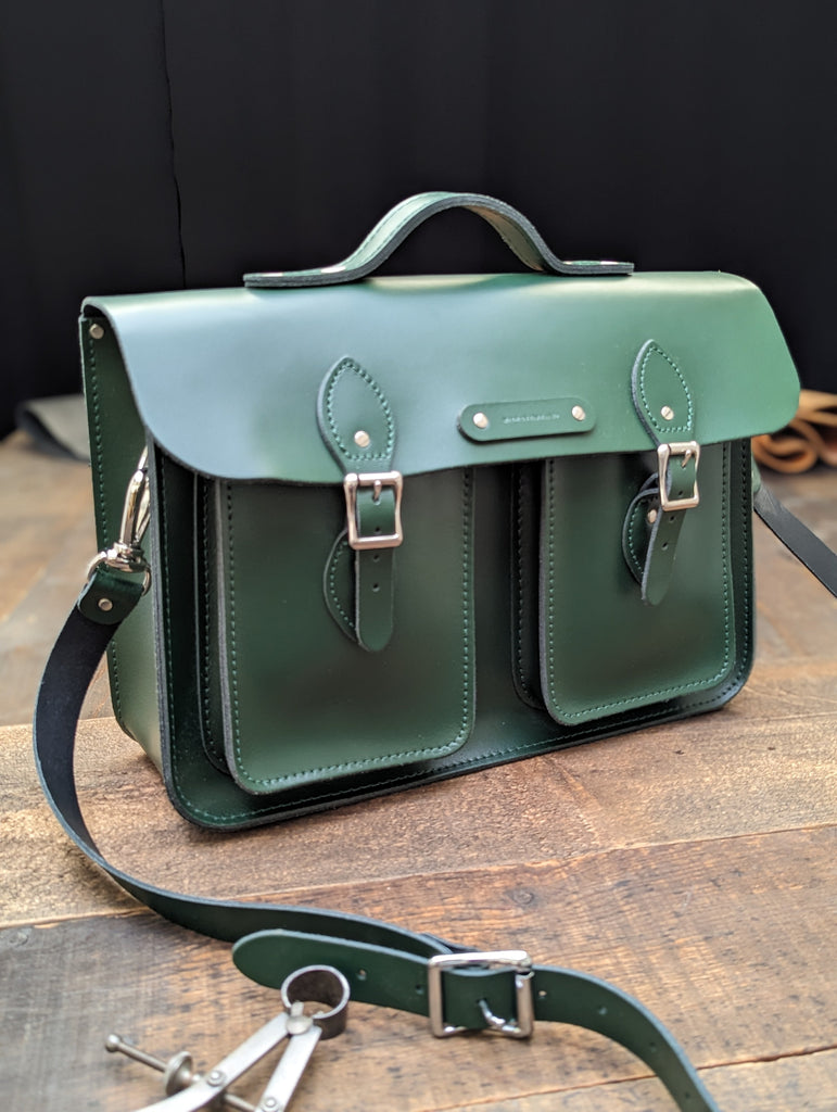 15" Clasic Satchel with Twin Front Pockets, a Bolt-on handle and a "Made in England" name plate, and a Key Loop made from Racing Green Leather (MMRP £202)