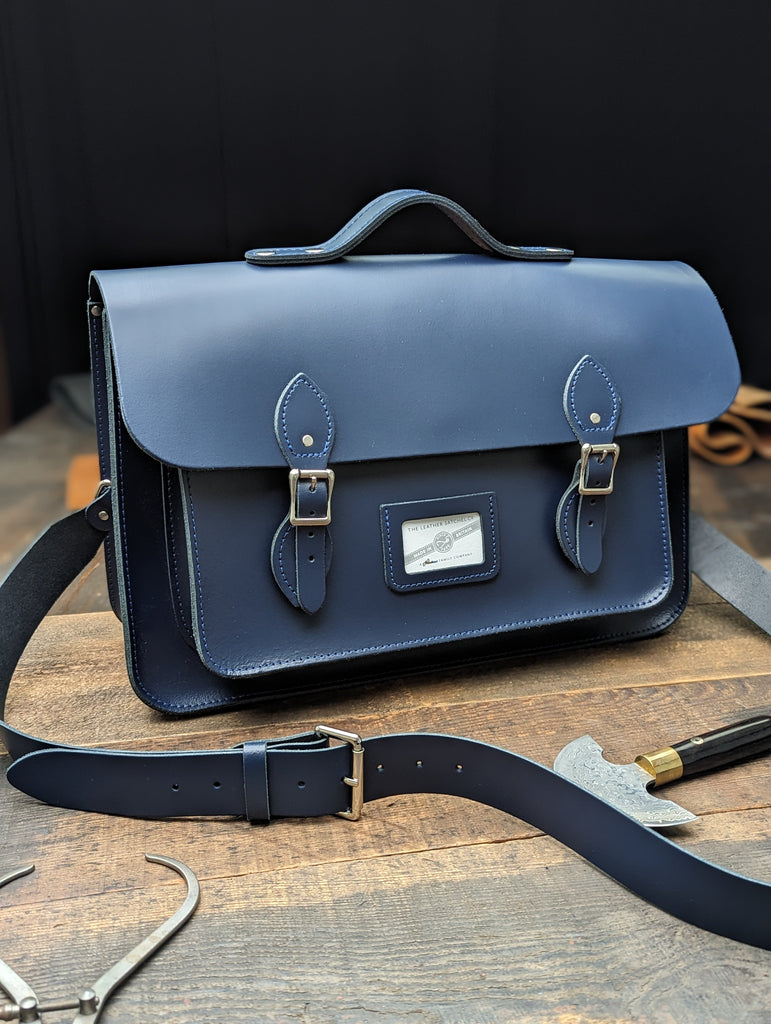 16.5" Classic Satchel with Hidden Magnetic Fasteners, a Bolt-on Handle, a 38mm Shoulder Strap and Interchangeable Backpack Straps made form Loch Blue Leather (MMRP £237)