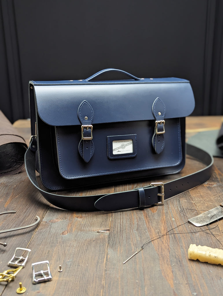 16.5" Briefcase Satchel with Hidden Magnetic Fasteners, a Full Inner Slip Pocket, Outer Slip Pocket and a 38mm Shoulder and Shoulder Pad made from Loch Blue Leather (MMRP £293)