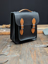 Small Portrait Backpack with a 25mm Volume Boost, Full Inner Slip Pocket, Outer Slip Pocket and Key Loop made from Charcoal Black and London Tan Leathers (MMRP £228)